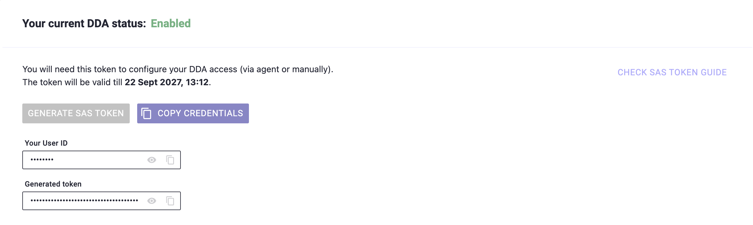 The same card after generating: the token's expiry date, the Copy Credentials button, and the User ID and token fields